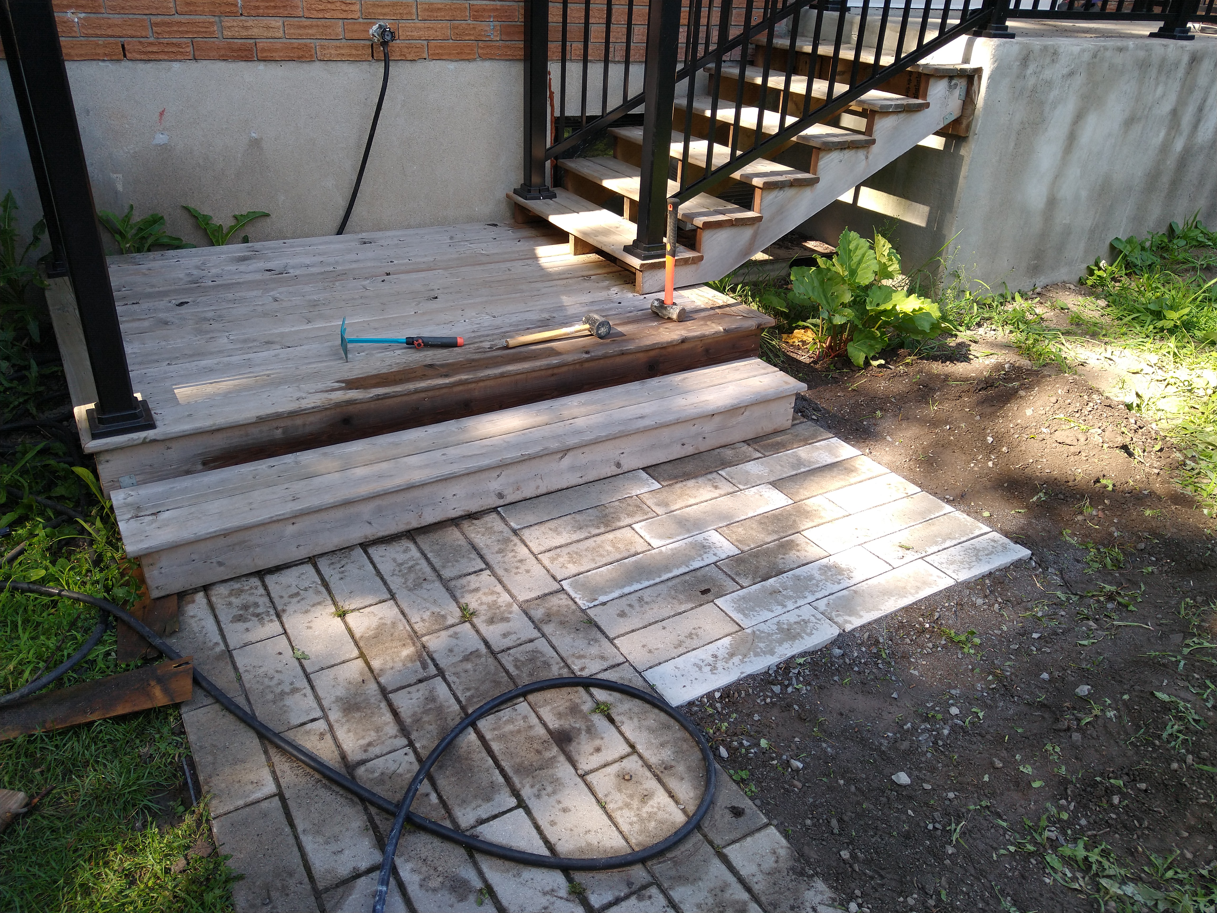 Figure 5: picture of the final result, showing pavers sidewalk and the stairs sitting on it properly.